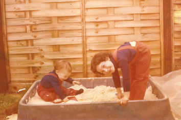 Playing in sandpit with Debbie