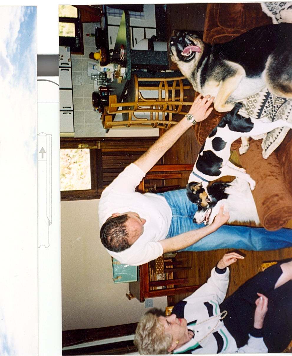 Playing with three dogs simultaneously. Granny Helen visiting at Wilderness.