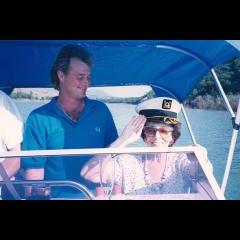 Granny Freda with Adrian steering boat on Dam